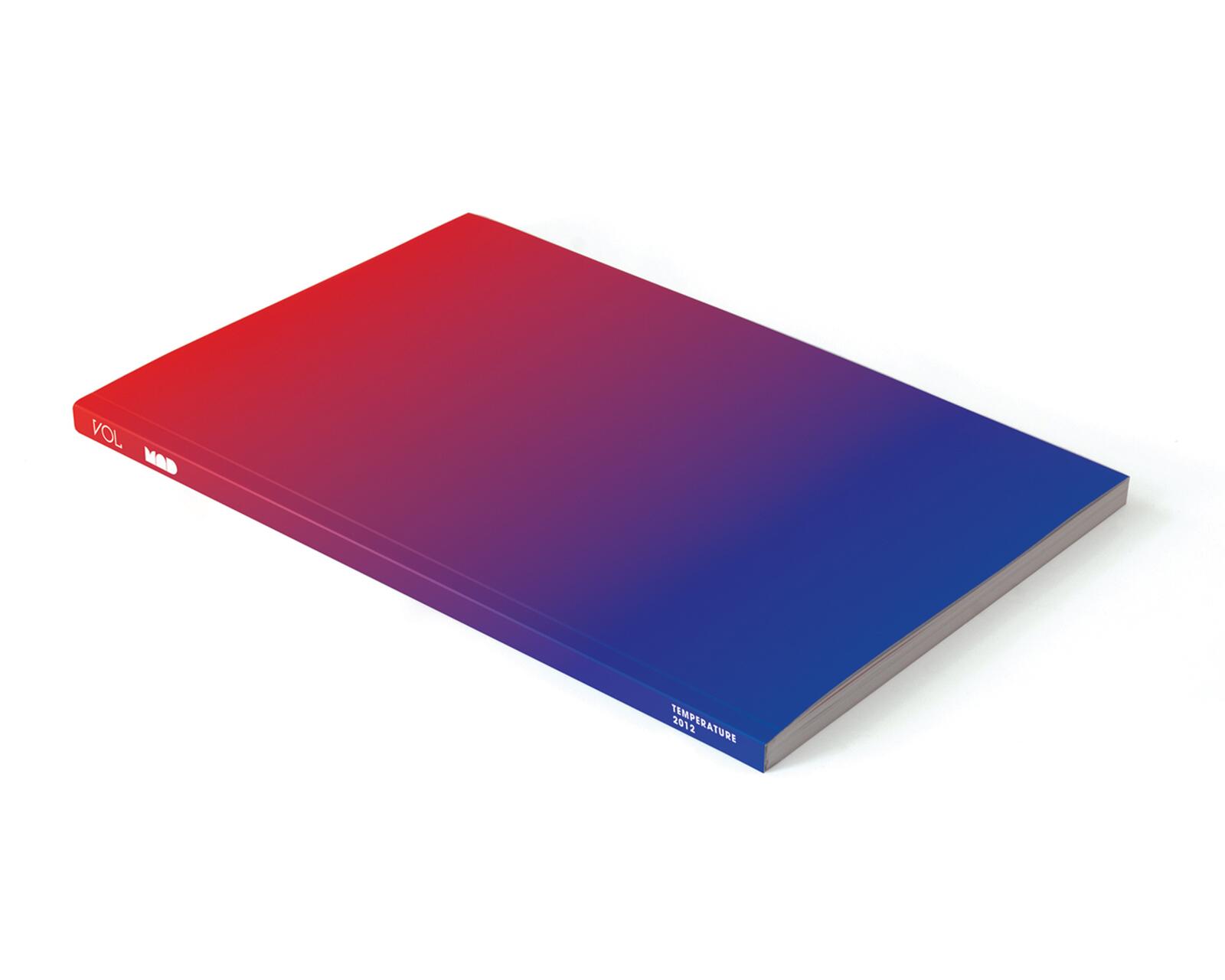 Gradient color book cover transitioning from red to blue, lying flat with visible spine.